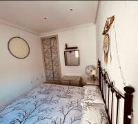 Posteľ alebo postele v izbe v ubytovaní Chez Vida Vera Playa nudista