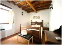 A bed or beds in a room at Can Vich