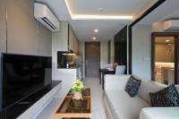 Posezení v ubytování Sea View 1-BR 36 m2 Panora Surin by Holy Cow