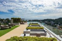 Posezení v ubytování Sea View 1-BR 36 m2 Panora Surin by Holy Cow