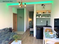 Kuchyň nebo kuchyňský kout v ubytování Apartments Garden House