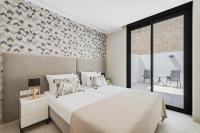 Posteľ alebo postele v izbe v ubytovaní SUNRISE BENIDORM by Costa Activa Rentals