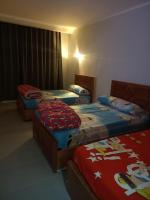 Postel nebo postele na pokoji v ubytování Scandic Resort Hurghada
