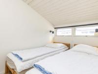 Postel nebo postele na pokoji v ubytování Holiday home Vejers Strand XXI