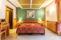 Posteľ alebo postele v izbe v ubytovaní G. Hotel Des Alpes (Classic since 1912)