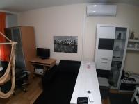 TV a/nebo společenská místnost v ubytování Apartment