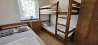 Posteľ alebo postele v izbe v ubytovaní Domki letniskowe,apartamenty Wczasowa 8a