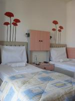 Postel nebo postele na pokoji v ubytování La Santre Villa