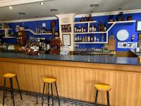 The lounge or bar area at Alojamiento Rural Mar de Olivos