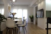 Telewizja i/lub zestaw kina domowego w obiekcie Apartamento Granada-Hipercor