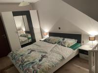 Posteľ alebo postele v izbe v ubytovaní Apartmani G&E