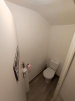 a small bathroom with a toilet in a room at Duplex district Saint Ruf near ramparts Avignon center in Avignon