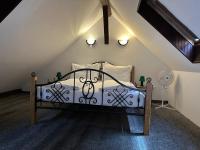 Łóżko lub łóżka w pokoju w obiekcie Lesní Hotel Peršlák