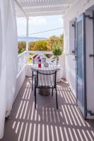 Balkón alebo terasa v ubytovaní Milos Bay Suites