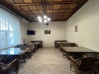 a conference room with tables and chairs and a window at Barvy Dnipra in Dnipro