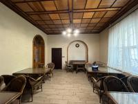 a conference room with tables and chairs and a window at Barvy Dnipra in Dnipro