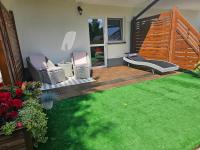 Vonkajšia záhrada v ubytovaní Apartament 1B Niebieskie Apartamenty Poddąbie dawniej Blue Marine z basenem krytym, odkrytym, salą zabaw, animacjami