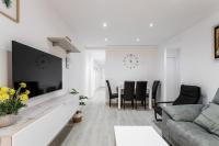 TV a/nebo společenská místnost v ubytování Sur Suites Principe