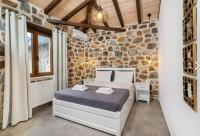 Posteľ alebo postele v izbe v ubytovaní Petra Residence