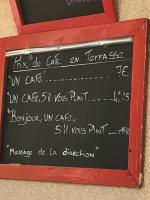 a chalkboard with writing on it in a red frame at Vie Ventoux in Malaucène