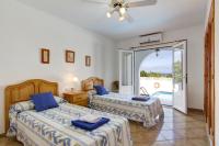 Posteľ alebo postele v izbe v ubytovaní Villa Claudia by Villa Plus