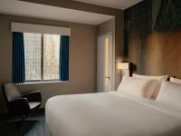 Ein Bett oder Betten in einem Zimmer der Unterkunft The Cloud One New York-Downtown, by the Motel One Group