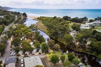 an aerial view of a town with a river at Lorne Foreshore Caravan Park in Lorne