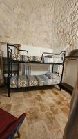 A bed or beds in a room at Vacanza In Puglia