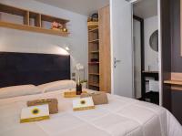 Posteľ alebo postele v izbe v ubytovaní Club del Sole Rivaverde Easy Camping Village