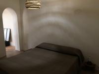 A bed or beds in a room at Casa Carmela