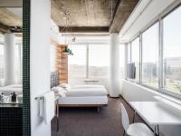 A bed or beds in a room at Hotel Daniel Vienna - Smart Lifestyle Near City Centre
