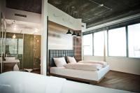A bed or beds in a room at Hotel Daniel Vienna - Smart Lifestyle Near City Centre
