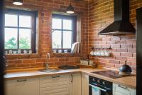 Kuchnia lub aneks kuchenny w obiekcie Herbarium Bieszczadzkie Apartamenty