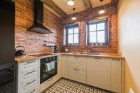 Kuchnia lub aneks kuchenny w obiekcie Herbarium Bieszczadzkie Apartamenty