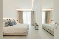Posteľ alebo postele v izbe v ubytovaní Arcs Suites & Residences