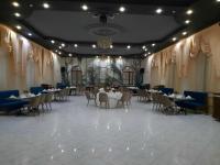 Posezení v ubytování BANQUETING & GUEST HOUSE ПОМЕСТЬЕ