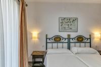 Posteľ alebo postele v izbe v ubytovaní Apartamento pie de jardín en Roses