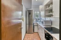 Kuchyňa alebo kuchynka v ubytovaní Apartamento pie de jardín en Roses