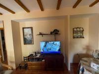 TV a/nebo společenská místnost v ubytování CASA PETRA : Bonita casa rural en Yunquera