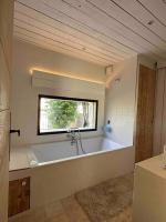 Um banheiro em Le Nid des Amis -Villa, jardin, vue &agrave; la montagne