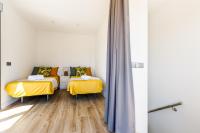 Posteľ alebo postele v izbe v ubytovaní A&N Viñuela Luxury centro