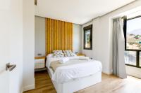 Posteľ alebo postele v izbe v ubytovaní A&N Viñuela Luxury centro