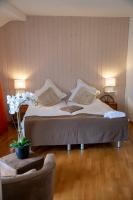 Postel nebo postele na pokoji v ubytování Hotel de la Place