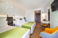 A bed or beds in a room at Climia Benidorm Plaza