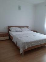 Postel nebo postele na pokoji v ubytování Apartment Mariana