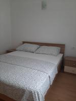 Postel nebo postele na pokoji v ubytování Apartment Mariana