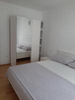 Postel nebo postele na pokoji v ubytování Apartment Mariana
