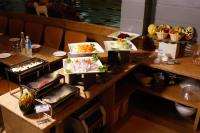 a table with several plates of food on it at Hotel Dolphin Grand in Varanasi