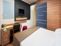 TRYP BY WYNDHAM São Paulo Airport - Hotel de Transito Terminal 3 -Lado Ar - Área restrita á passageiros já embarcados - Piso 1にあるベッド