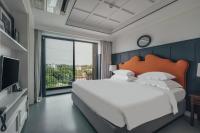 Sugar Marina Hotel -AVIATOR- Phuket Airportにあるベッド